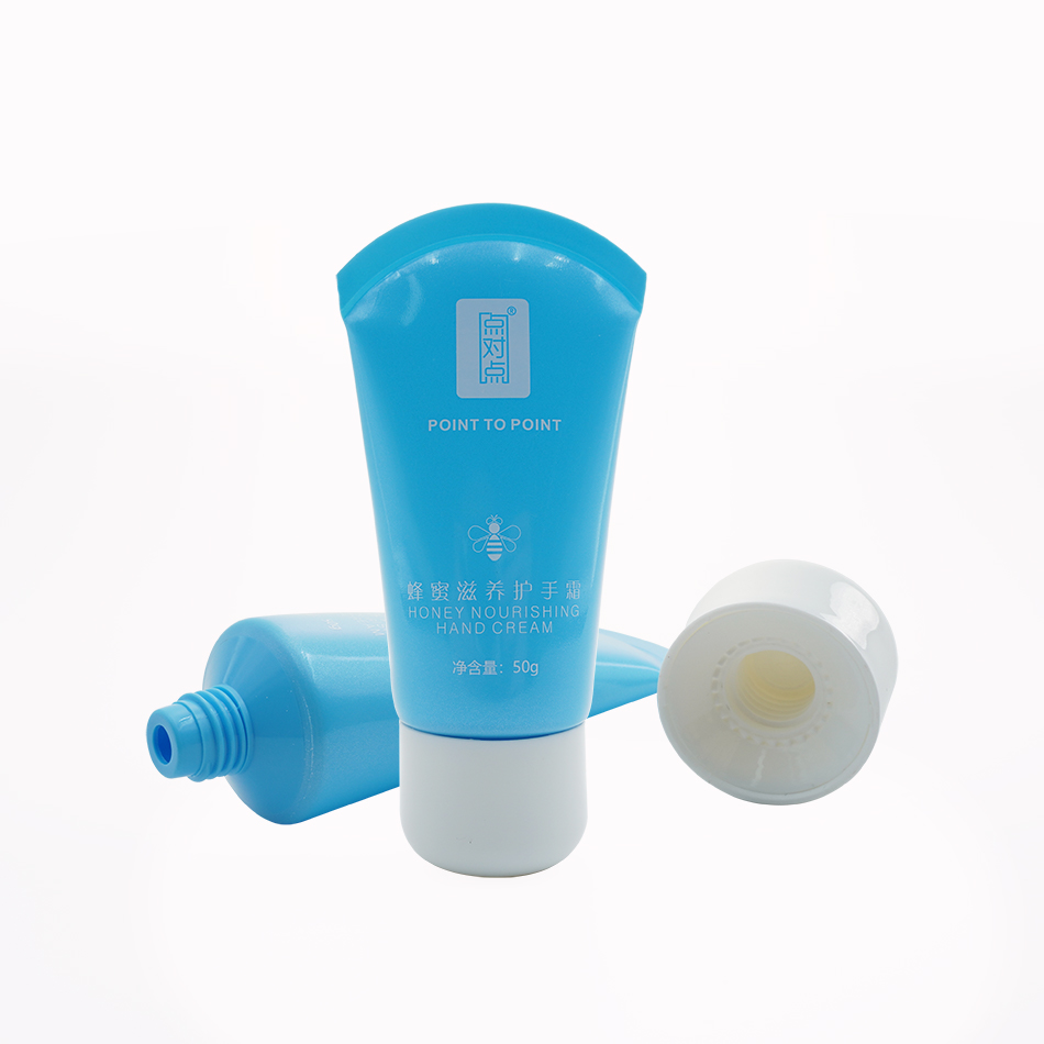 Tubo pequeño de crema de manos para recuerdo de fiesta.