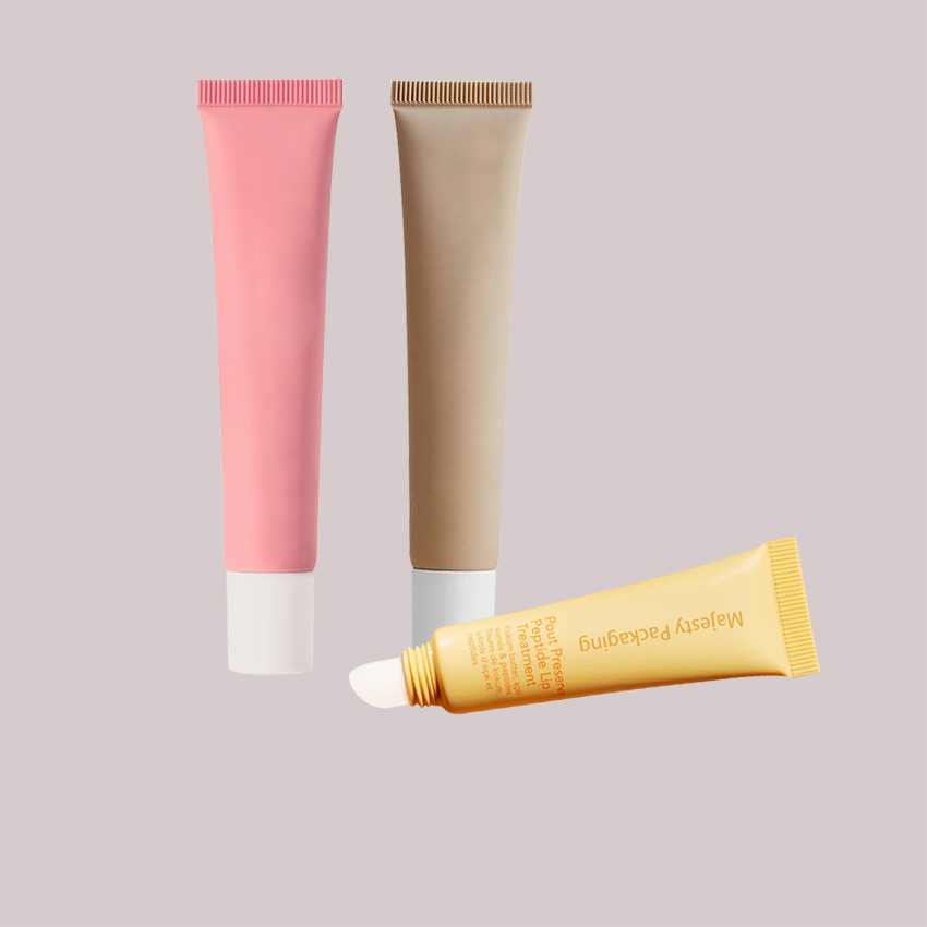 Leere Lipgloss-Tuben mit Zauberstab